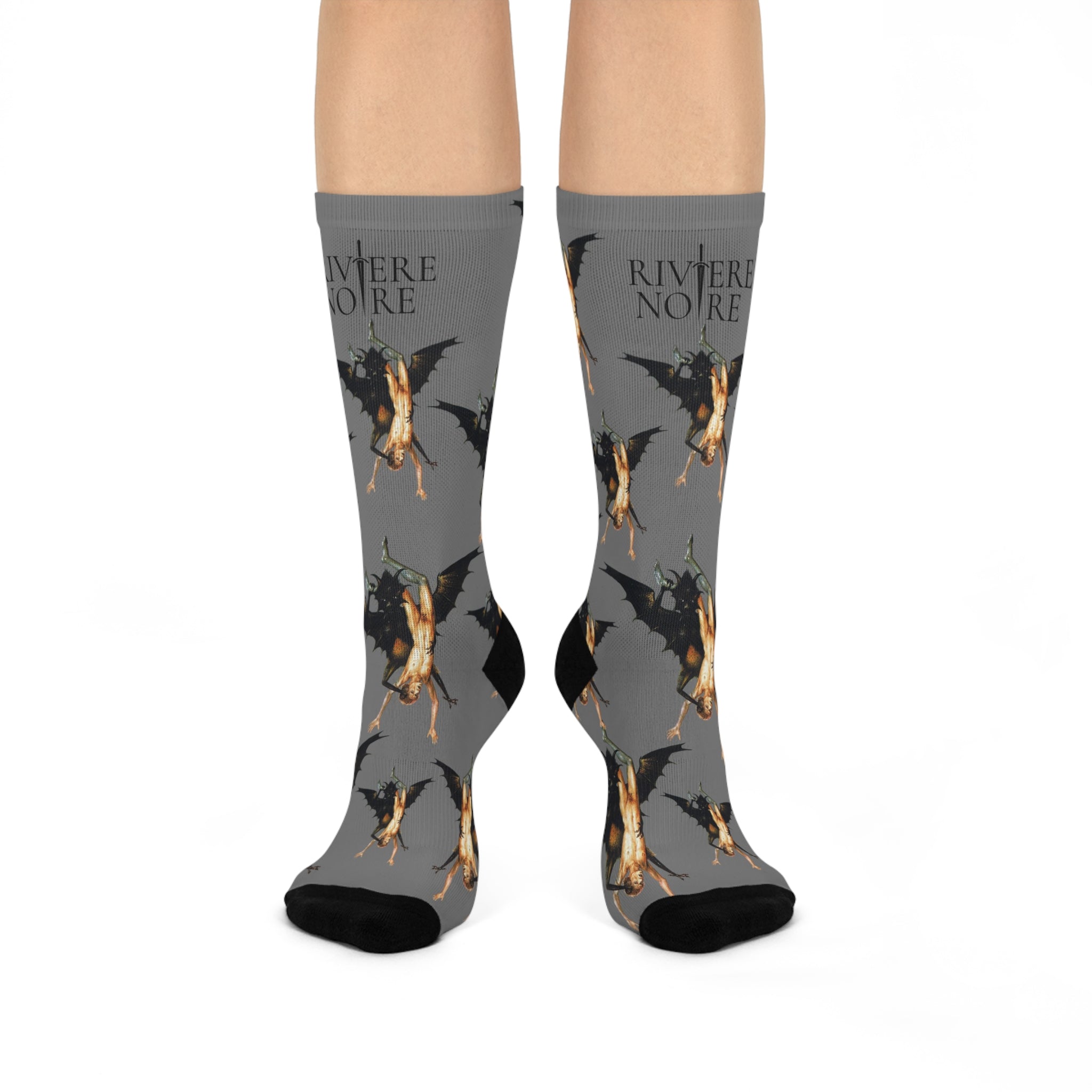Peter Paul Rubens’s The Fall of the Damned oil on panel painting printed on gray socks. Repeating pattern of man and creature. Socks display on foot model